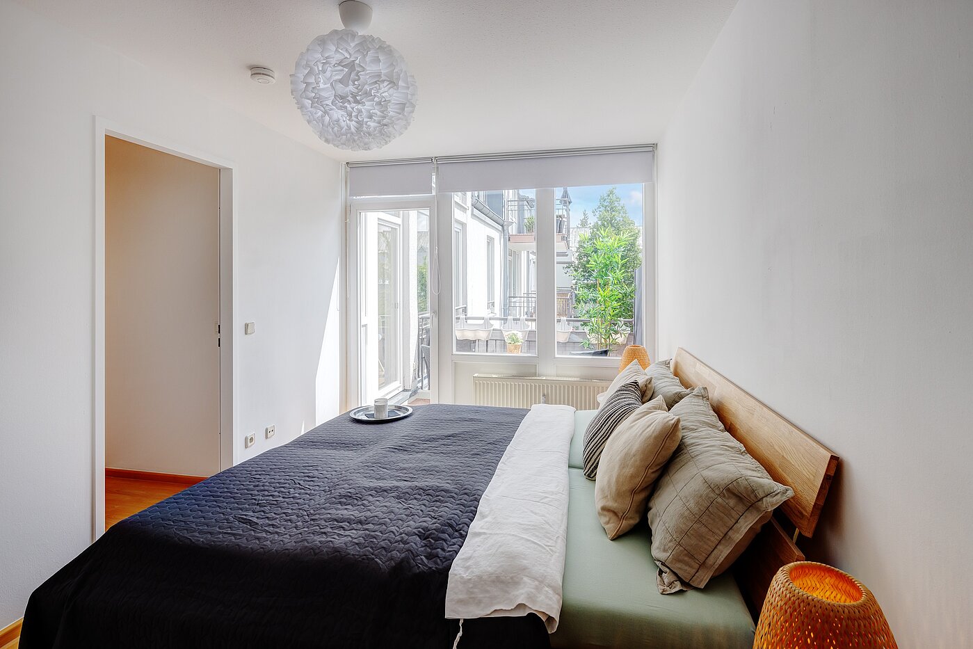 Etagenwohnung mit 2 Zimmern | München-Obersendling | 70039 | Das Schlafzimmer mit Zugang zum Balkon