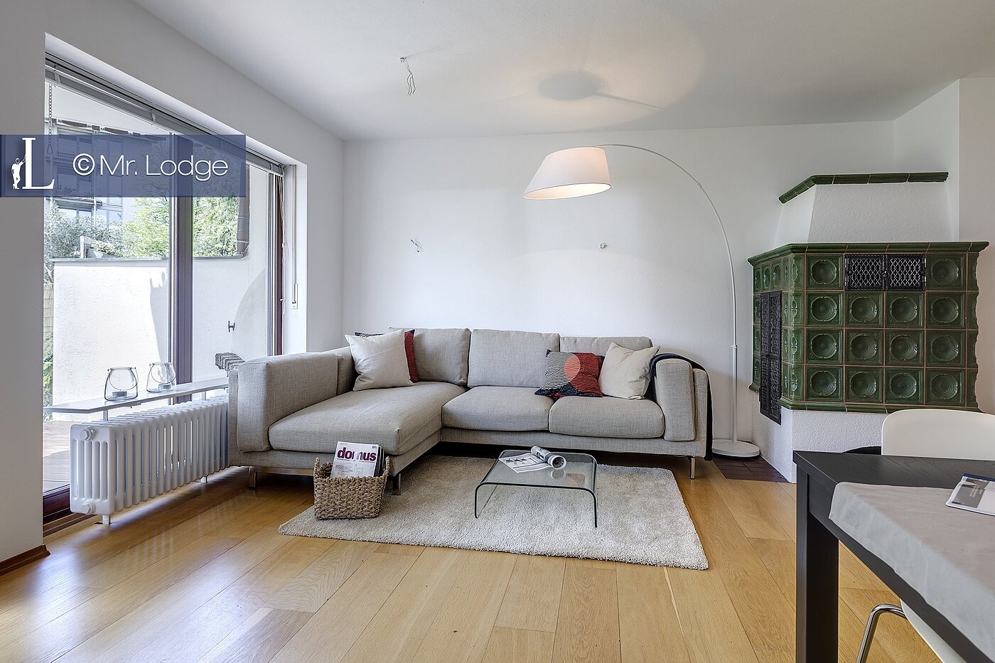 Erdgeschosswohnung mit 2 Zimmern | München-Harlaching | 1704ML6 | Wohnzimmer mit Kachelofen