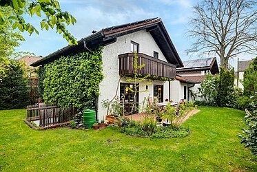 Neubiberg: Charmantes Einfamilienhaus mit mediterranem Wohnflair und sonnigem Garten