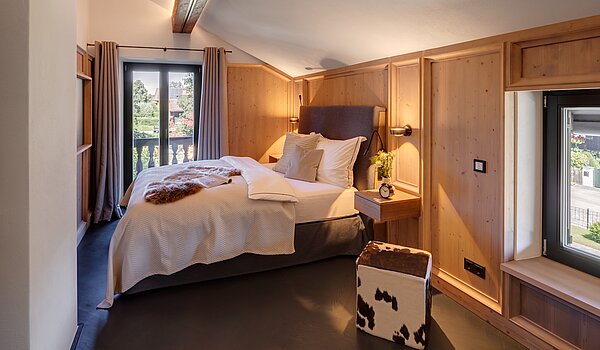 Besondere Immobilie mit 15 Zimmern | Bad Wiessee | 701591 | Chalet I Gästezimmer