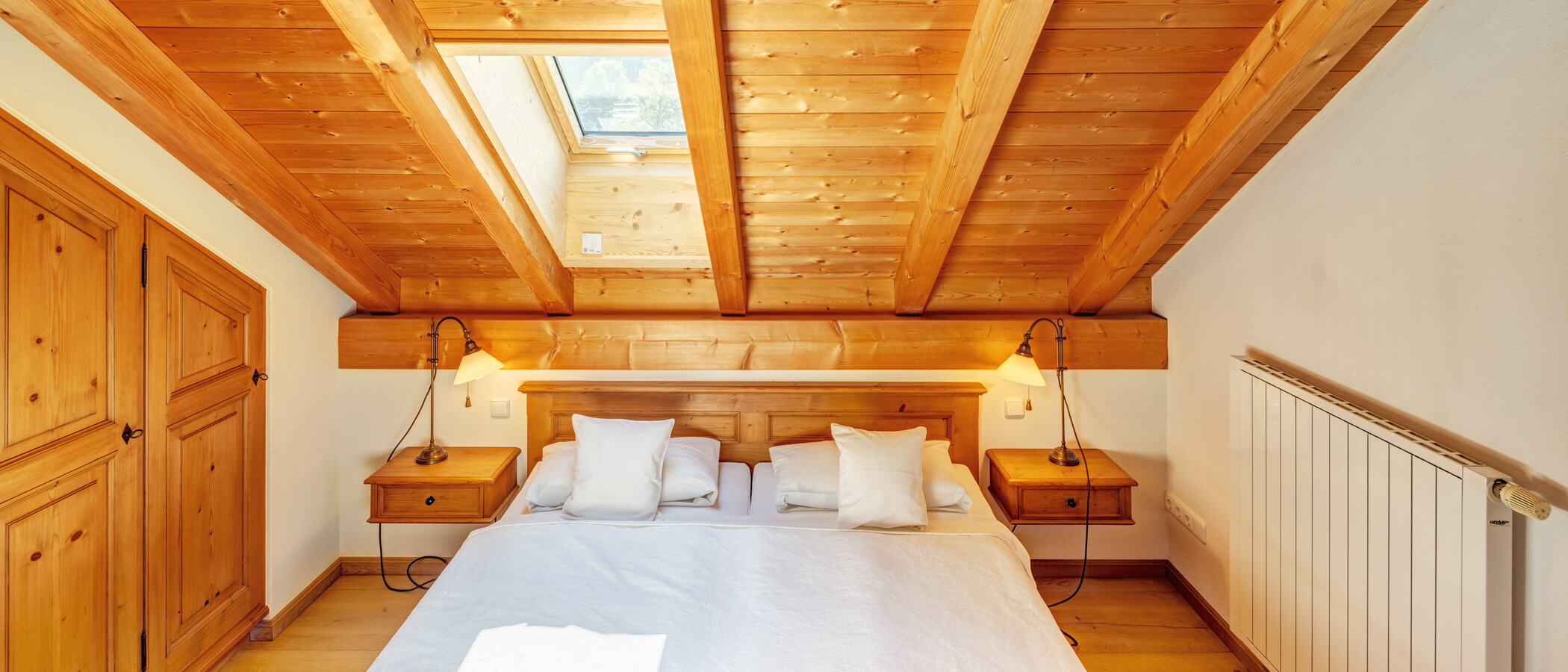 Dachgeschosswohnung Bad Heilbrunn 01 Schlafbereich 12826