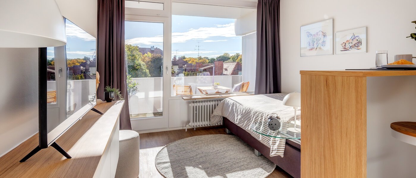 Apartment München Schwabing-Nord (zw. Leopoldstraße & Englischen Garten) 04 Wohnbereich 2242