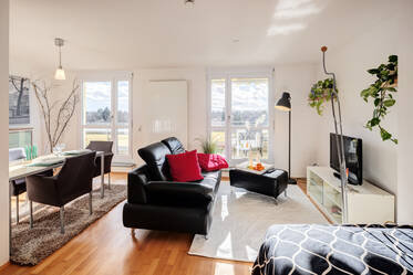 Lichtdurchflutete Wohnung mit großer Dachterrasse 