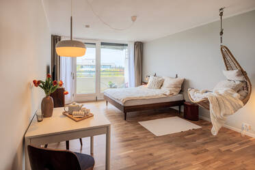 Lichtdurchflutetes Apartment mit S/W-Balkon, Pool & Sauna