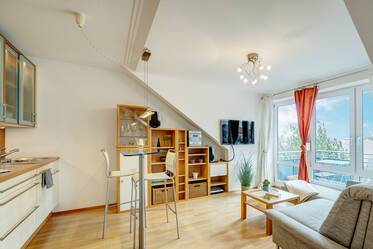 Helle Dachgeschosswohnung in grüner Wohnanlage